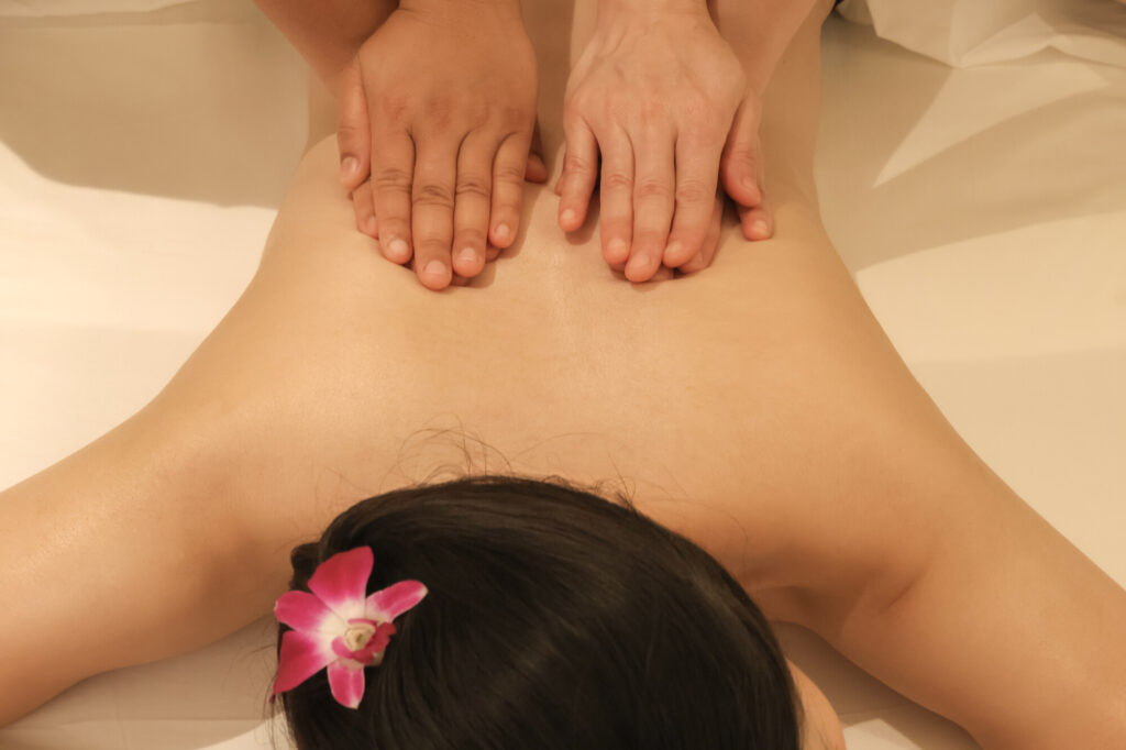 A woman getting a back massage