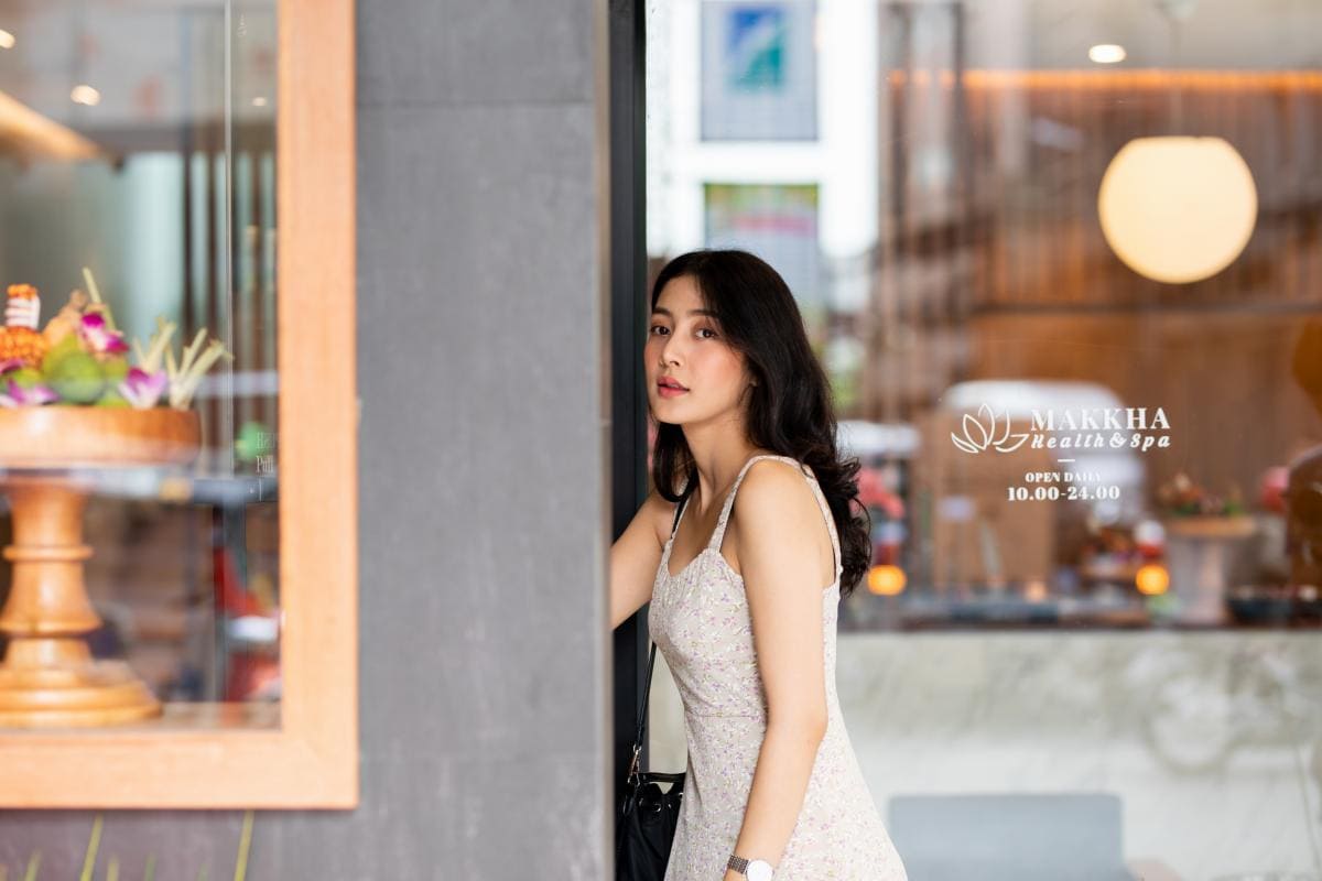 A woman entering Makkha Health & Spa for her treatment