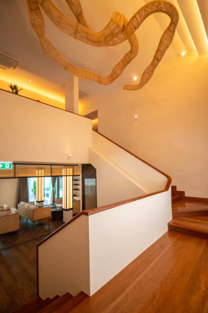 makkha-spa hotel-lobby wooden-staircase interior-design