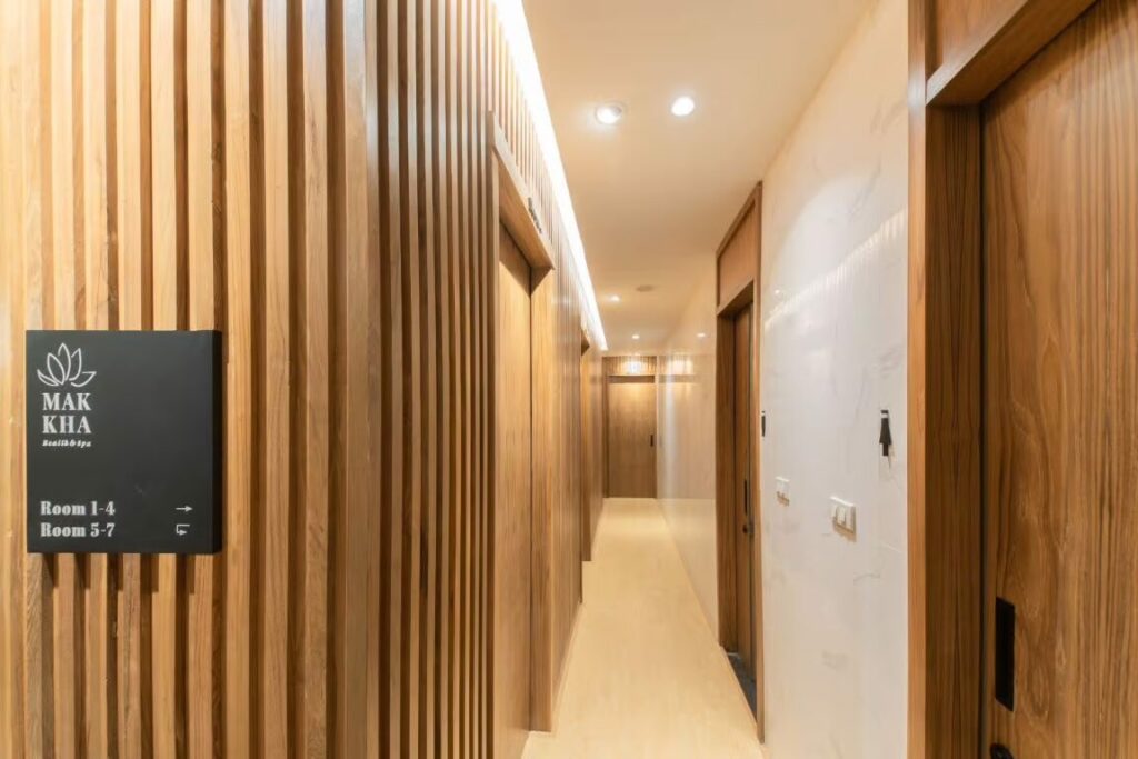 makkha-spa spa-interior-design wood-slat-wall modern-hallway