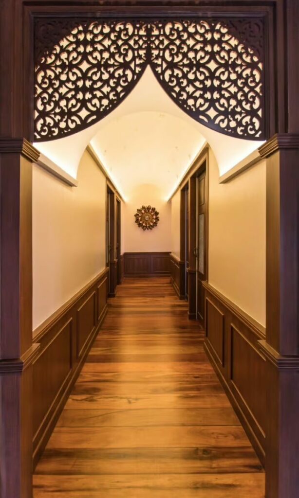 makkha-spa wooden-hallway interior-design carved-archway