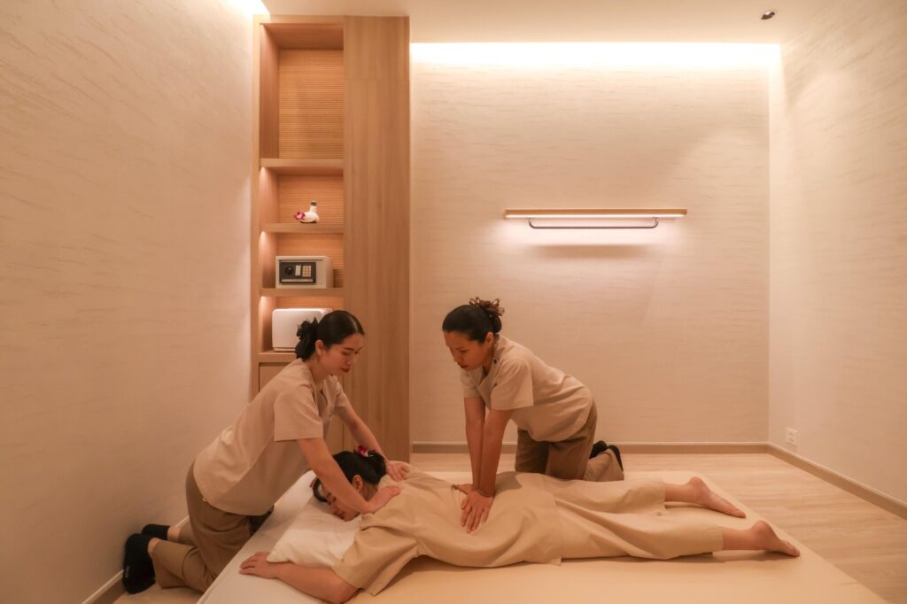 A woman having a traditional Thai massage